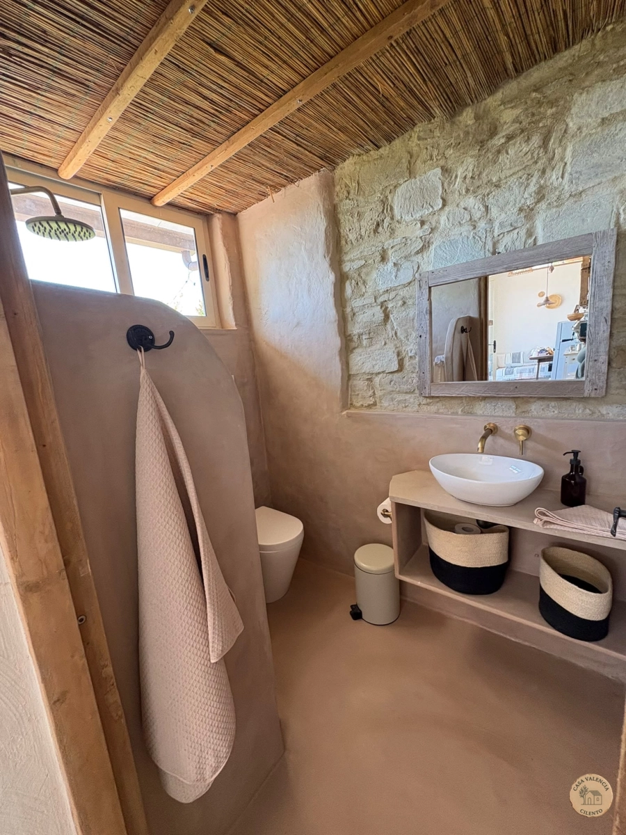 Bathroom vanity with stone sink, Casa Valencia