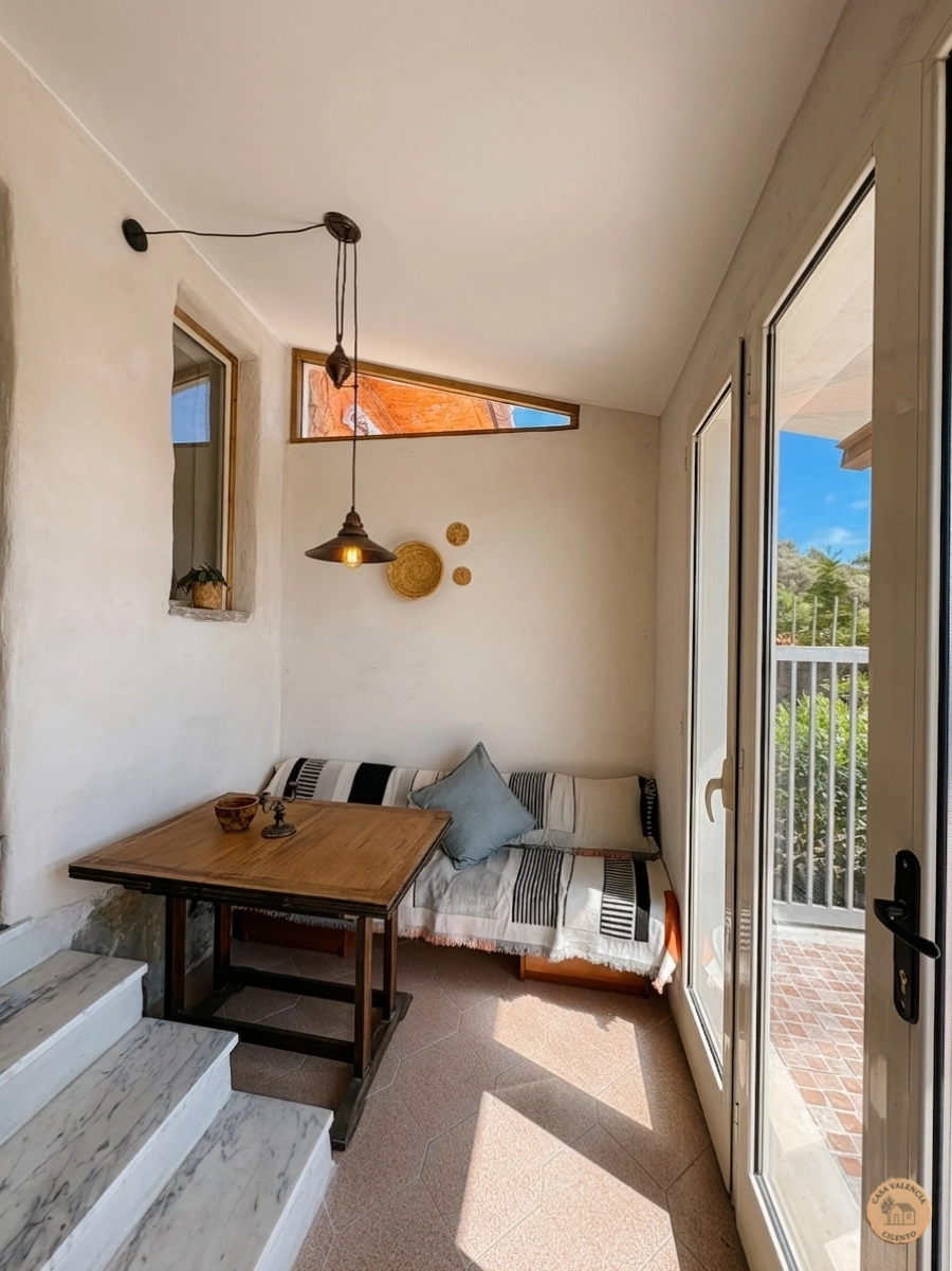 Dining area with rustic wooden table, Casa Valencia