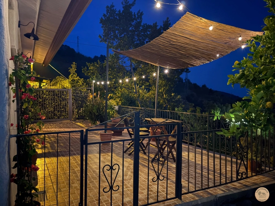 Terrace and garden at night, Casa Valencia